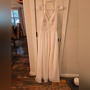 Azazie size small blush pink bridesmaid dress. Floral top with side slit